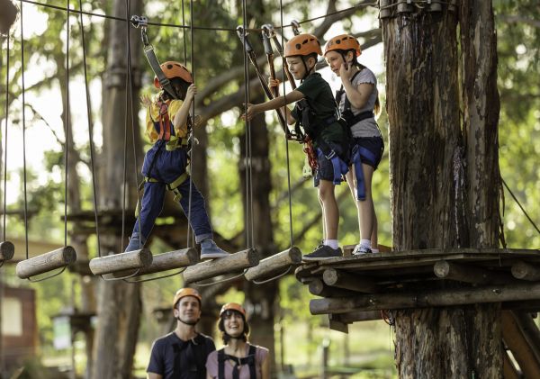 Children enjoying the action at TreeTops Adventure Park, Abbotsbury in Sydney's south west