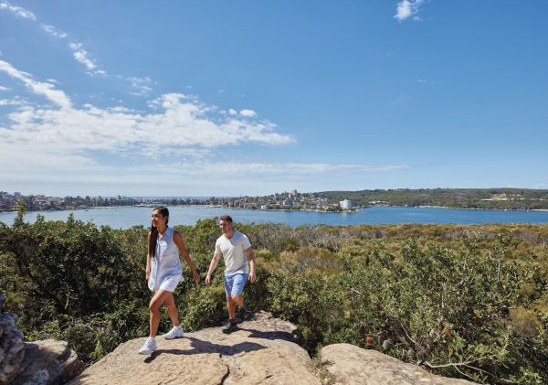 Spit Bridge to Manly Walk, Sydney Couple enjoying stunning coastal views of Sydney Harbour from Dobroyd Head, Balgowlah Heights