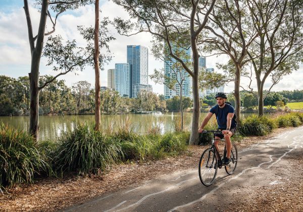 Bicentennial Park, Sydney Olympic Park A cyclist riding on the bike trail in Bicentennial Park, Sydney Olympic Park