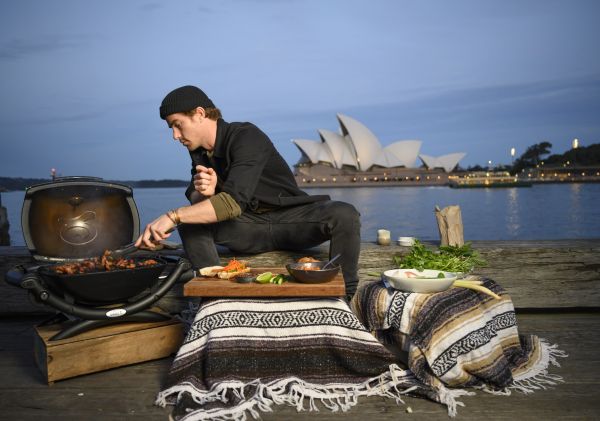 Hayden Quinn cooking Lemongrass Pork Roll - Sydney Harbour  – Sydney City	