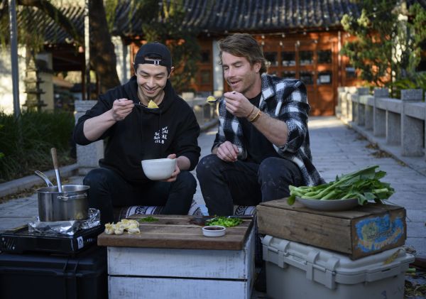 Hayden and Reynold Poernomo cooking Pork & Prawn Wonton Noodle Soup in Chinatown
