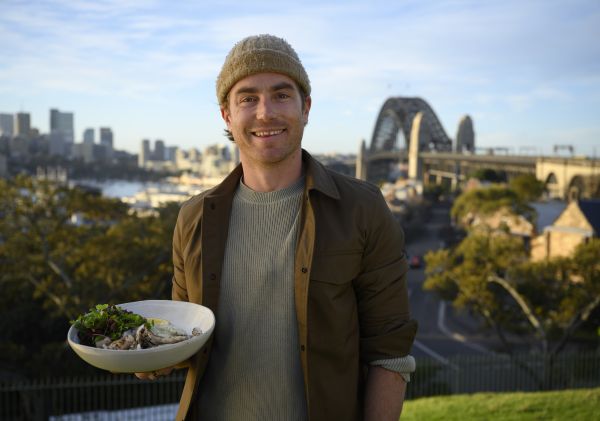 Hayden cooking Saltbush + Mountain Pepper Calamari with Micro Parsley Mayonnaise, Sydney Harbour