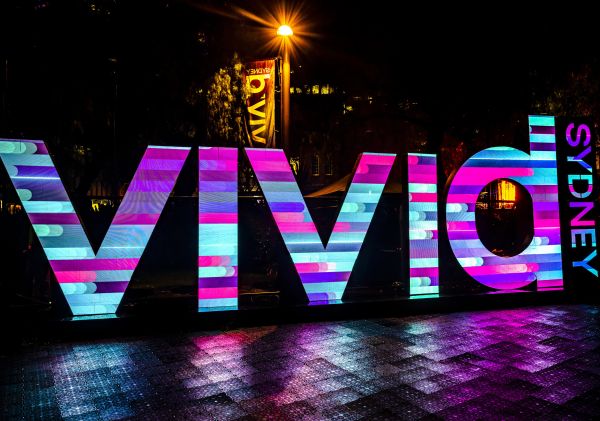 The Vivid Sydney logo shining bright in First Fleet Park, The Rocks during VIvid Sydney 2022