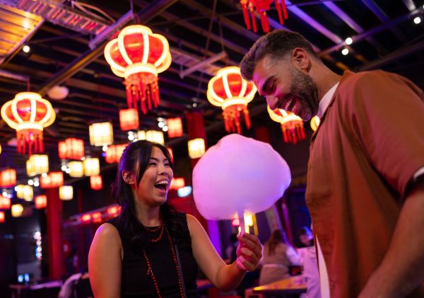 A couple enjoys the lights and food, Chinatown, Burwood