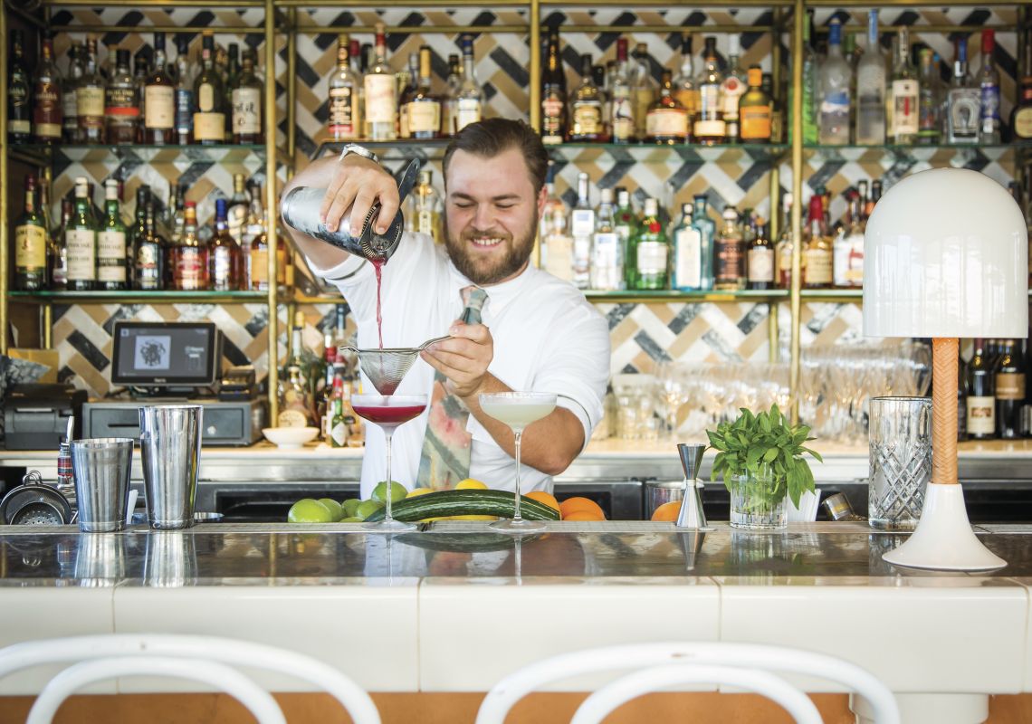 Bartender creating a cocktail at Henry Deane in Hotel Palisade Henry Deane, Hotel Palisade, Millers Point
