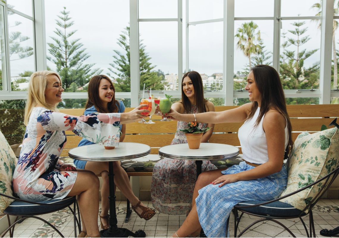 Friends enjoying afternoon drinks at Coogee Pavillion in Coogee Coogee Pavillion, Coogee