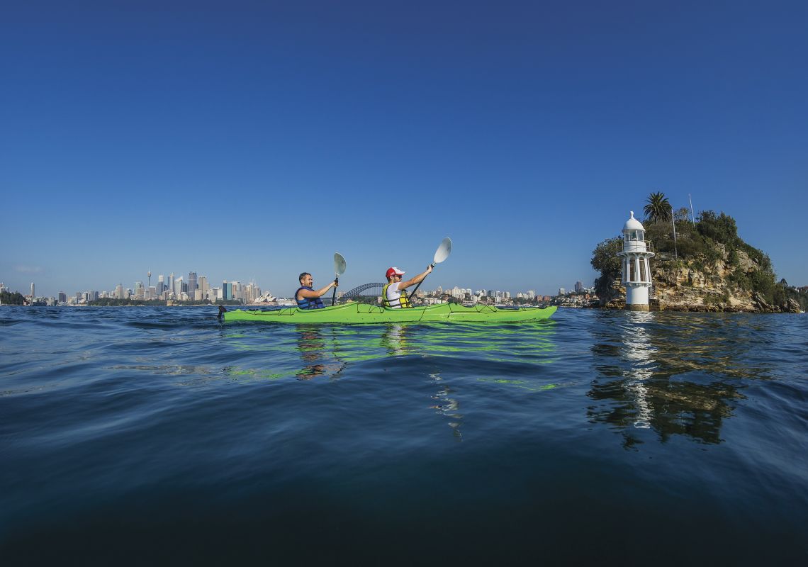 Cremorne Point, Sydney Harbour Men kayaking on Sydney Harbour near Cremorne Point