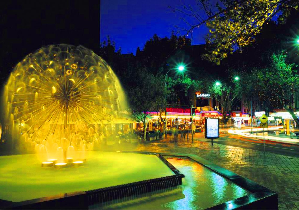 The El Alamein Fountain lit up at night, Kings Cross Sydney Kings Cross, Sydney