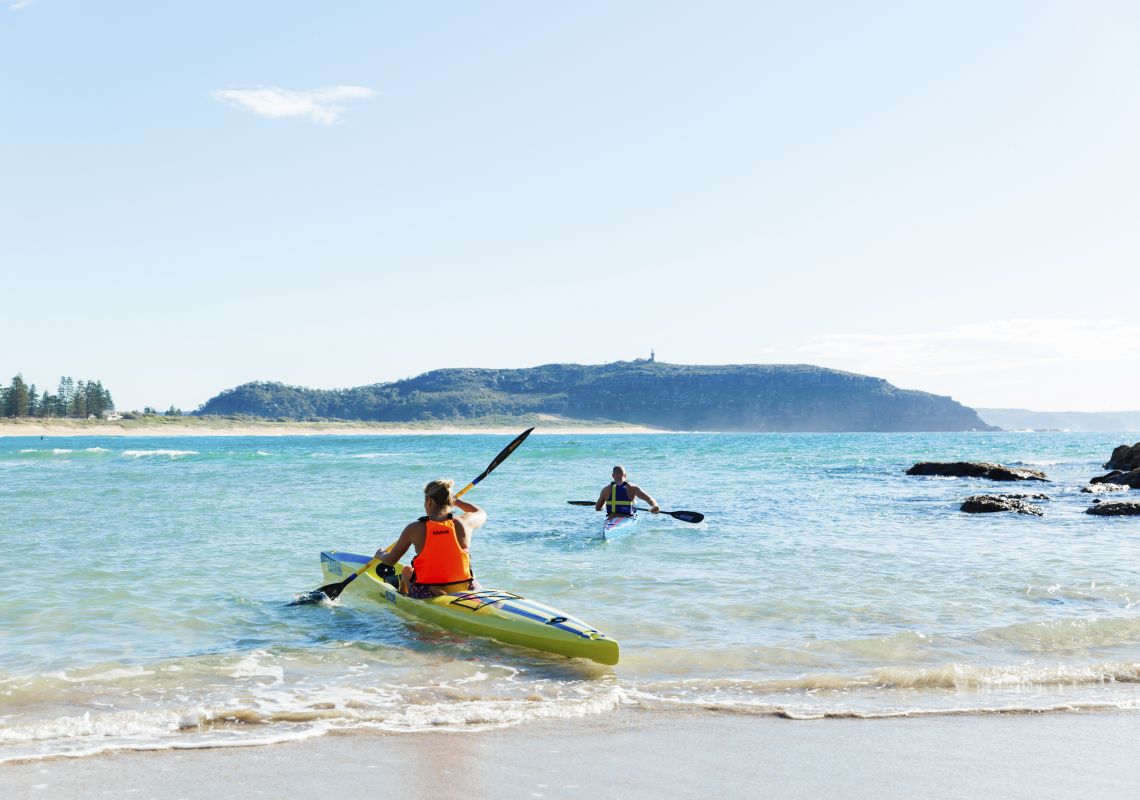 Kayaking, Palm Beach Couple enjoying a morning paddle at Palm Beach on Sydney's northern beaches