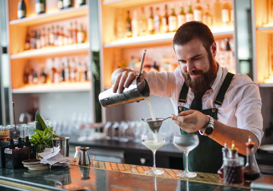 Nick and Nora's, Parramatta Bartender creating cocktails at Nick and Nora's bar in Parramatta