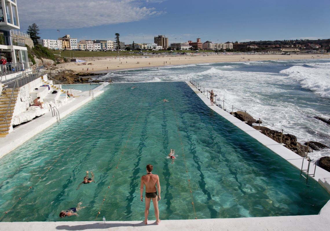 Swimming, Bondi Baths Long shot of swimmers at Bondi Baths, Bondi, with beach in the background, Sydney