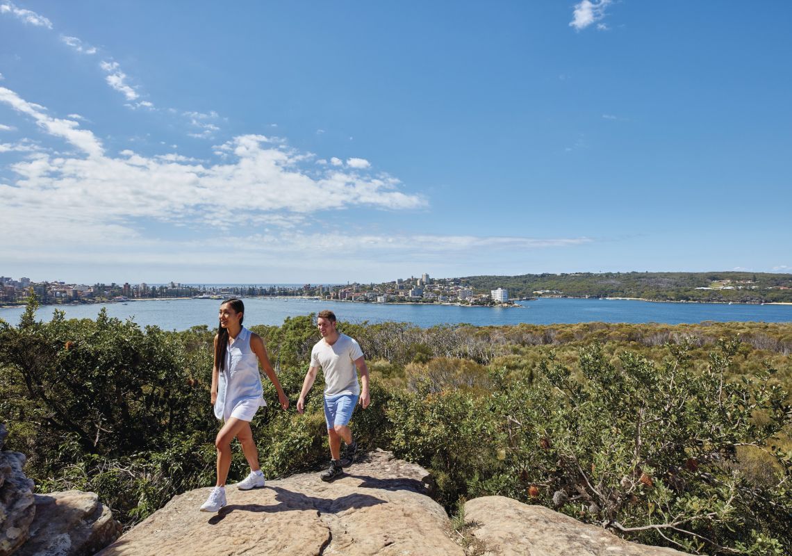 Spit Bridge to Manly Walk, Sydney Couple enjoying stunning coastal views of Sydney Harbour from Dobroyd Head, Balgowlah Heights