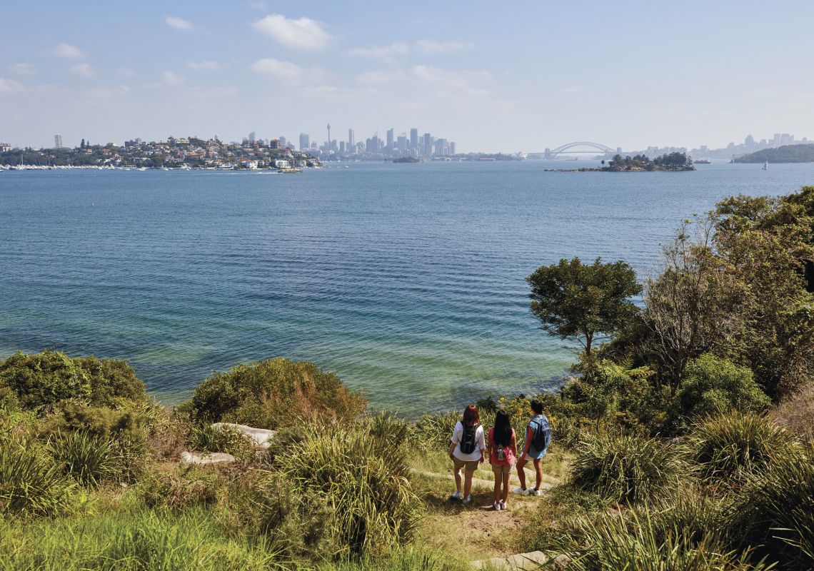 Friends enjoying scenic harbour views along the Hermitage Foreshore Track in Vaucluse, Sydney East