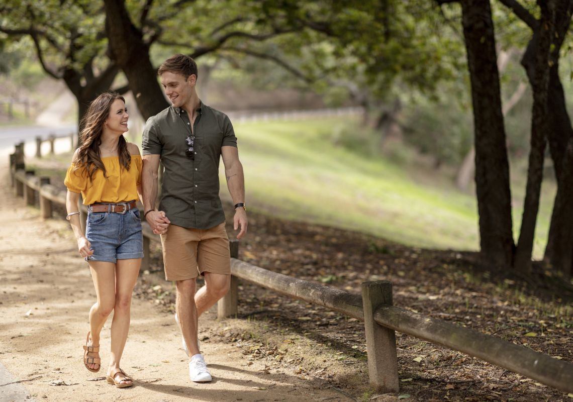 Couple enjoying a walk through Parramatta Park in Parramatta, Sydney West