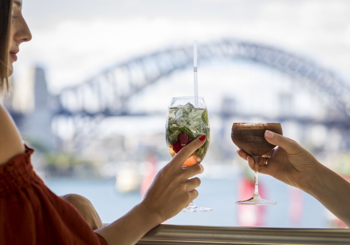 Hacienda Bar, Sydney Harbour Friends enjoying drinks with a view at Hacienda Bar, Pullman Quay Grand Sydney Harbour, Sydney City