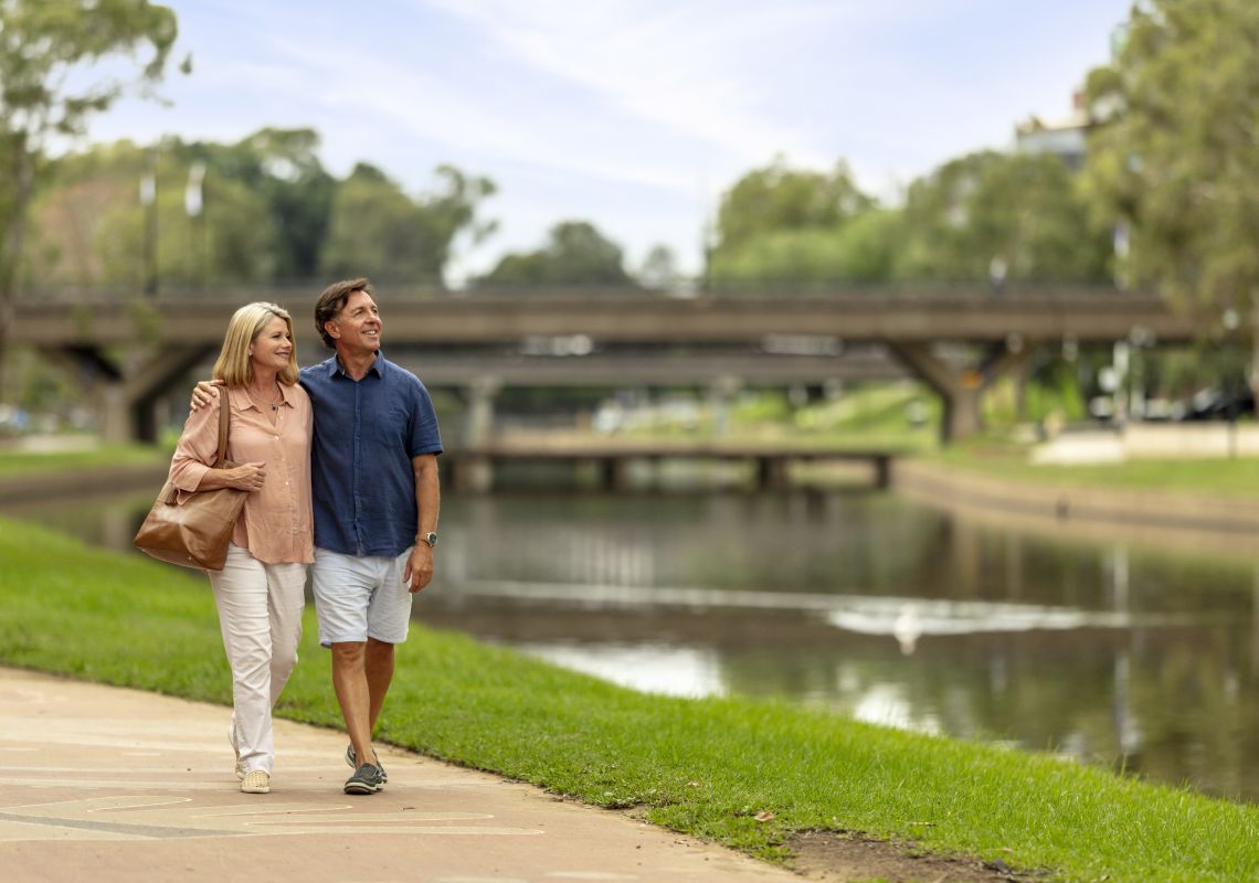 Parramatta River, Paramatta Couple enjoying a walk alongside Parramatta River in Parramatta, Sydney West