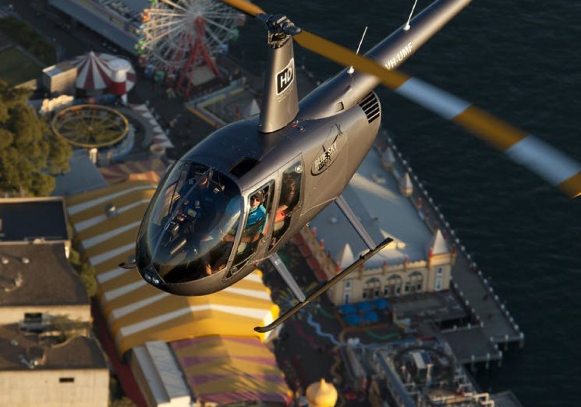 Blue Sky Helicopters R44 over Luna Park, Mascot Blue Sky Helicopters R44 over Luna Park in Mascot, Sydney South