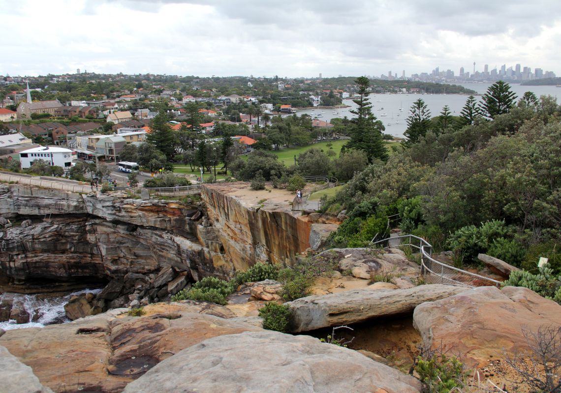 Gap Bluff Watsons Bay, Sydney Harbour National Park Gap Bluff Watsons Bay, coastal impacts, view towards Sydney business precinct, Sydney Harbour National Park. Caution, remain behind the fence