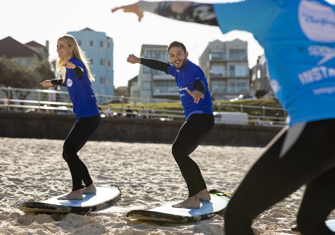 Lets Go Surfing, Bondi Beach Couple enjoying a surf lesson with Lets Go Surfing, Bondi Beach