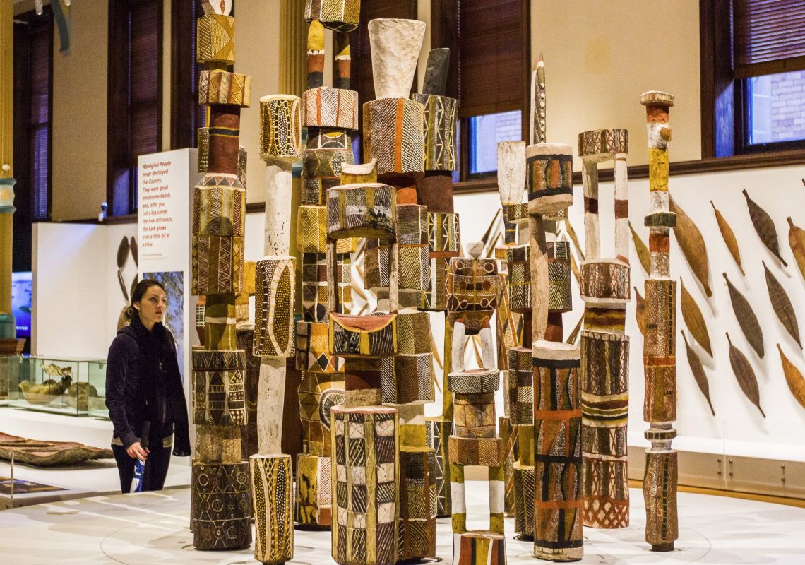 Indigenous Australians exhibition, Australian Museum - Credit: Abram Powell;Australian Museum Tiwi Poles on display at the Indigenous Australians exhibition in Australian Museum, Sydney