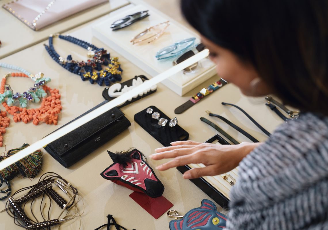 Woman browsing designer labels at the Parlour X fashion boutique on Oxford Street, Paddington