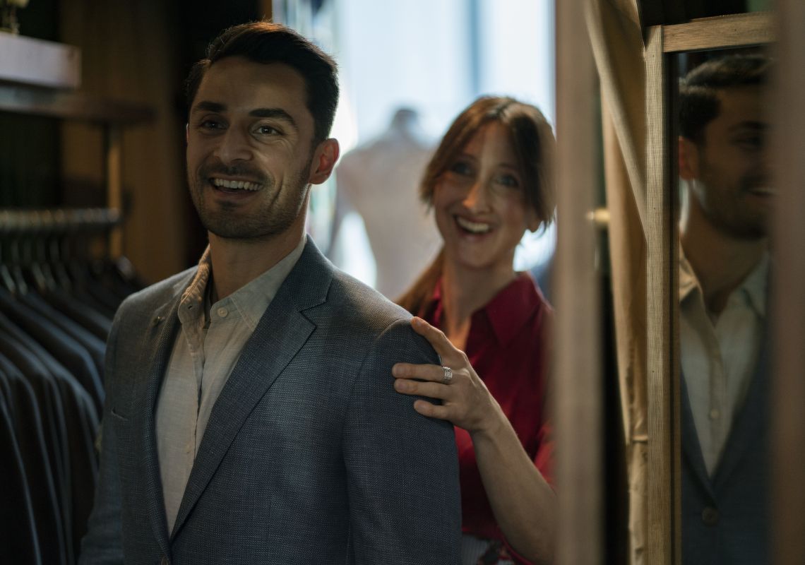 Man trying on clothing at Shirt Bar, Barangaroo, Sydney City