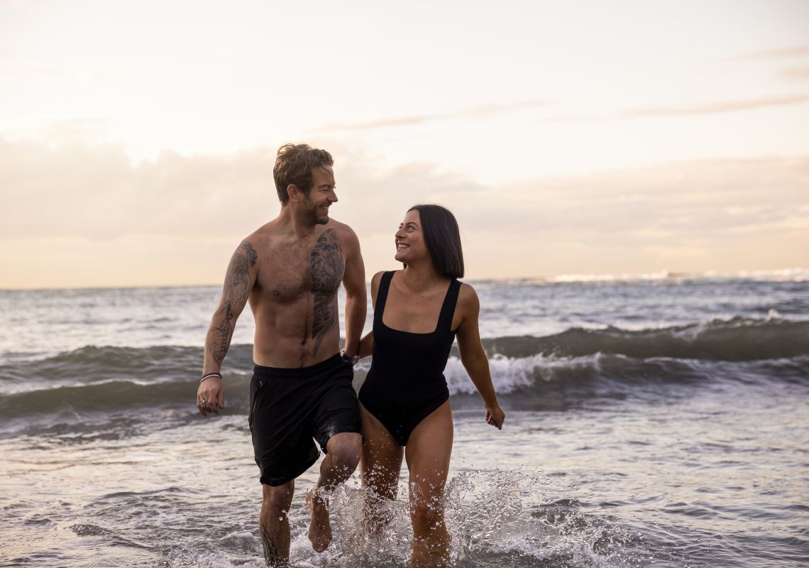 Couple enjoying a morning visit to Gordons Bay in Coogee, Sydney East