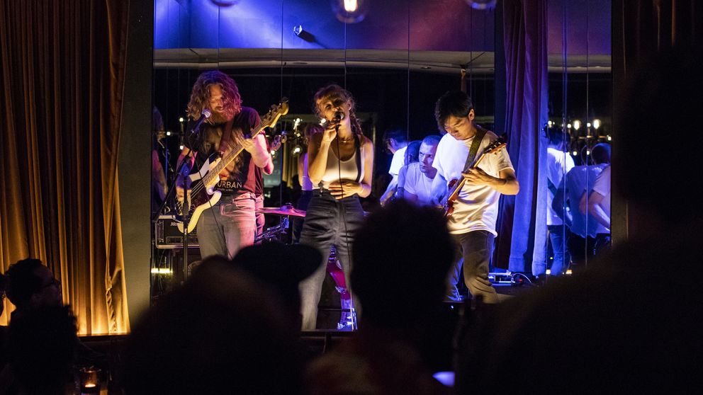 Patrons enjoying drinks and live music at Golden Age Cinema & Bar, Surry Hills