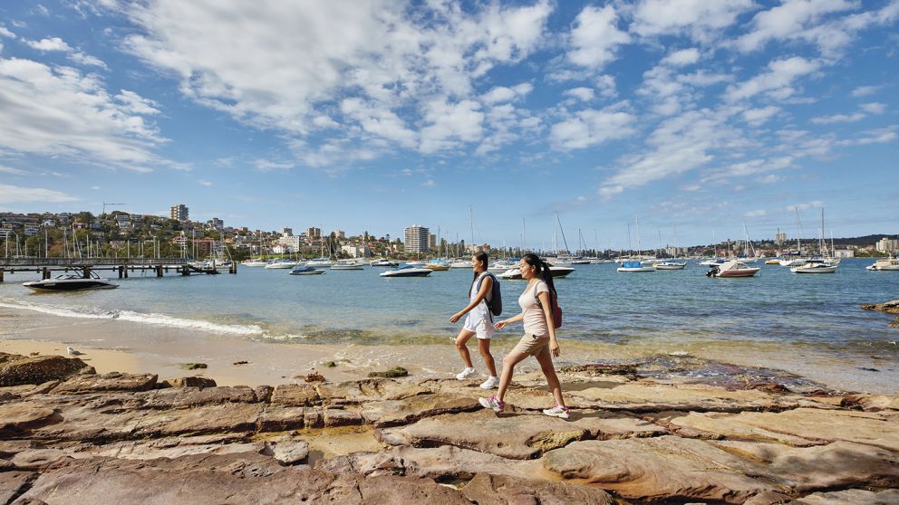 Friends enjoying a walk along Forty Baskets Beach, Balgowlah