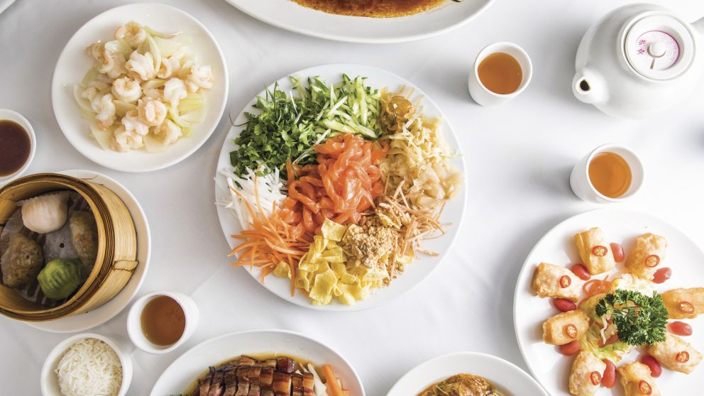 Chinese New Year food banquet with plate for prosperity toss at Golden Century Restaurant, Chinatown