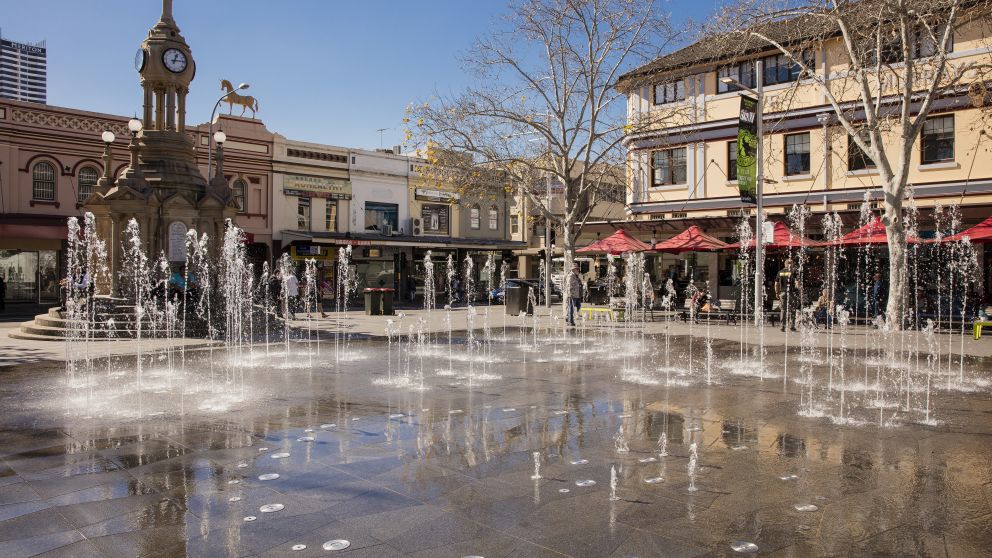The redeveloped Centenary Square water fountain featuring the historic Centennial Memorial Clock. Church Street, Parramatta