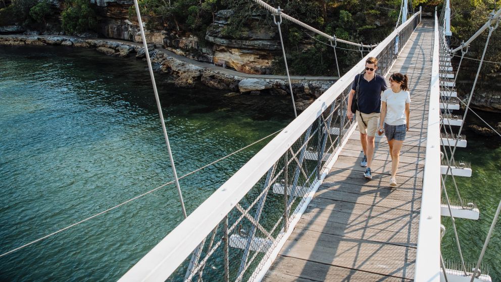 Couple enjoying a scenic walk around Parsley Bay, Vaucluse