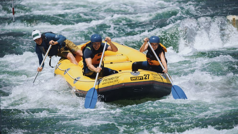 Couple enjoying a white water rafting experience at Penrith Whitewater Stadium in Sydney West