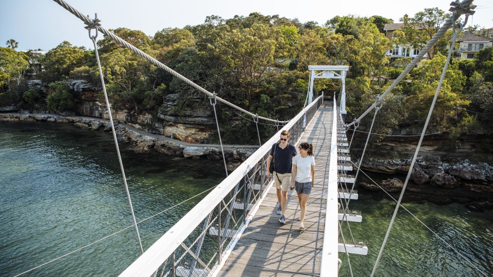 Couple enjoying a scenic walk around Parsley Bay, Vaucluse