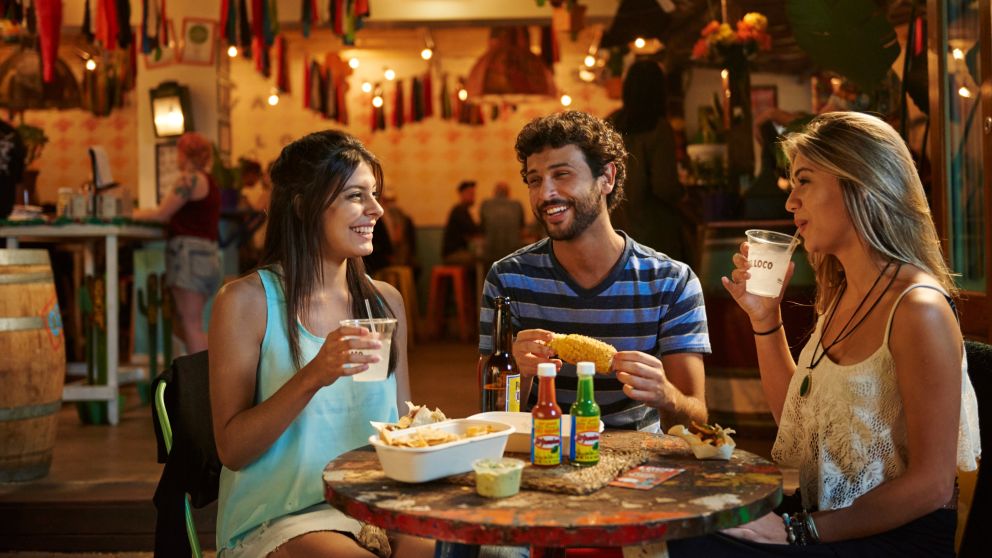 Students enjoying food and drink at El Loco in Surry Hills