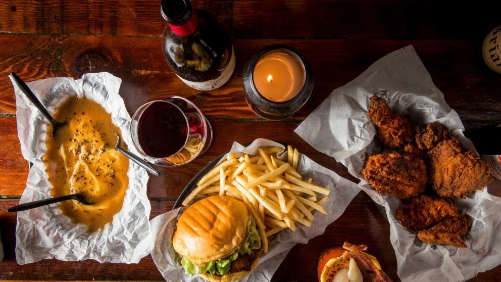 Potato and gravy, wine, cheeseburger, fries, fried chicken and a Bloody Burger Mary from Mary's Newtown, Newtown