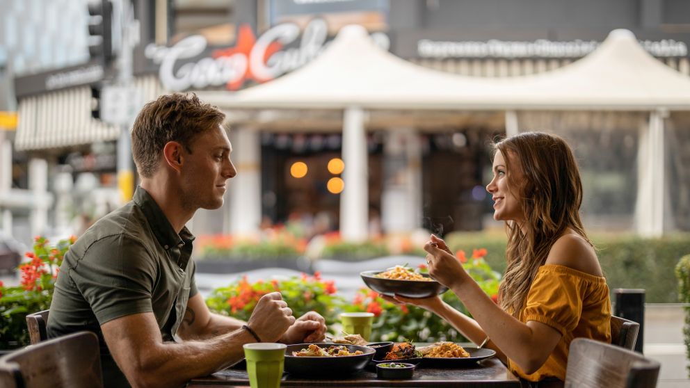 Couple enjoying food and drink at Thai La-Ong, Parramatta in Sydney's west