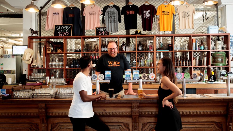 Couple ordering beers at Willie The Boatman, St. Peters, Sydney