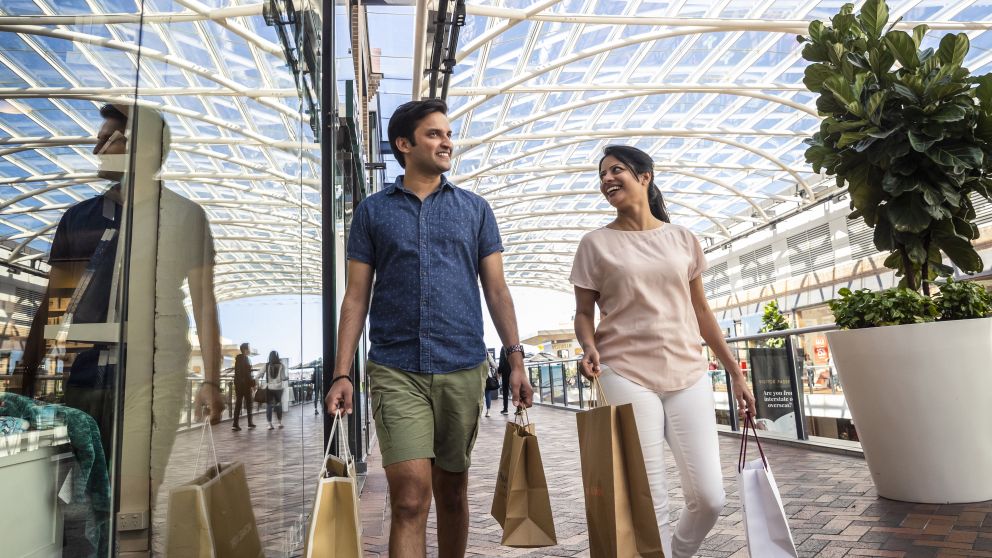 Couple enjoying a visit to Birkenhead Point Brand Outlet centre in the Inner Western Sydney suburb of Drummoyne, Inner Sydney