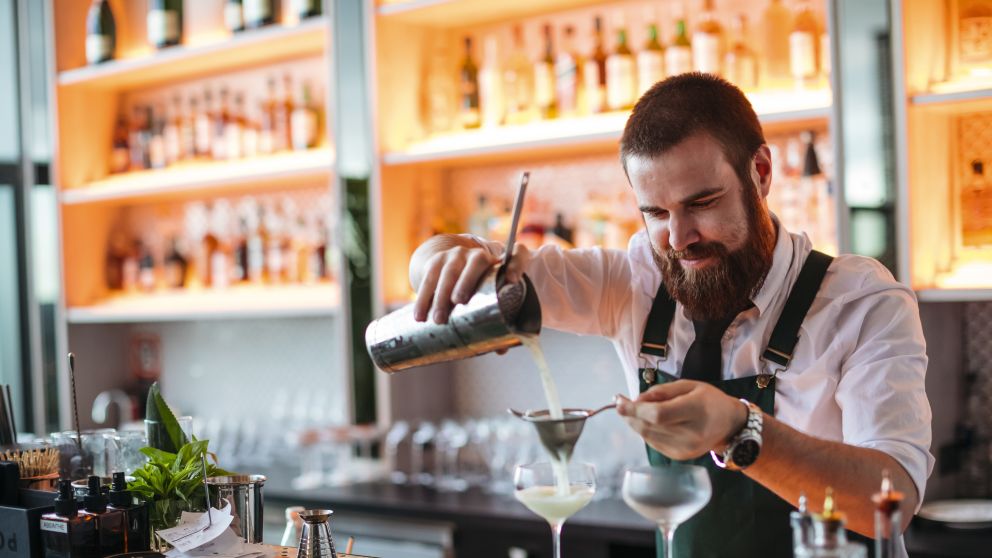 Bartender creating cocktails at Nick and Nora's bar in Parramatta, Sydney West