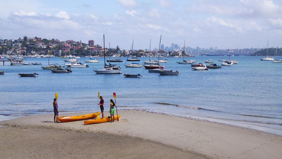 Friends enjoying a day of kayaking on Sydney Harbour, Sydney