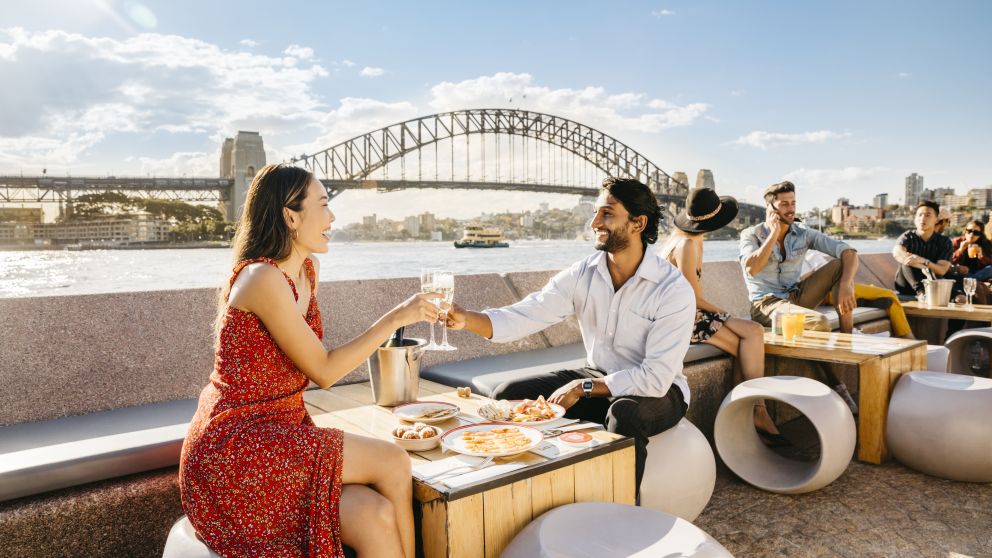 Couple enjoying a drink at Opera Bar on Sydney Harbour, Sydney City