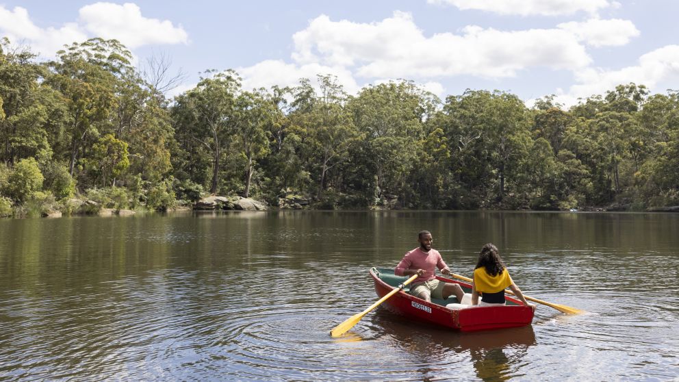 Couple enjoying a day out on Hunts Creek, Parramatta with Parramatta Rowboats, Sydney West