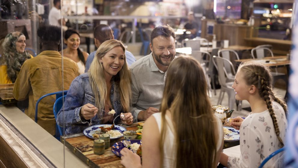 Family enjoying food and drink at Avasana Afghan Street Food, Merrylands, Sydney West