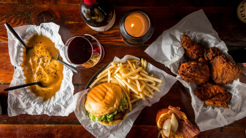 Potato and gravy, wine, cheeseburger, fries, fried chicken and a Bloody Burger Mary from Mary's Newtown, Newtown