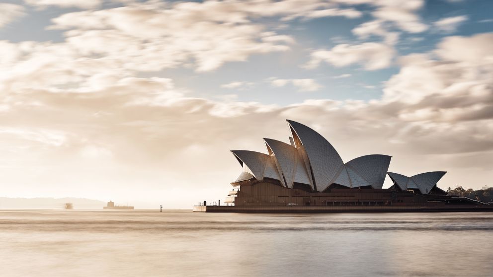 Morning sun rising over the Sydney Opera House, Sydney