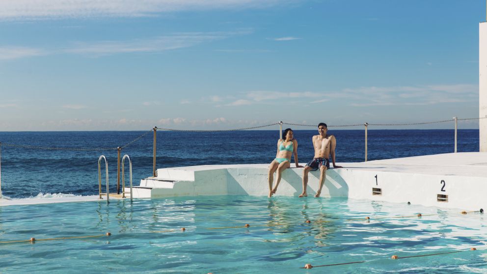 Couple enjoying a morning swim at Bondi Icebergs, Bondi Beach