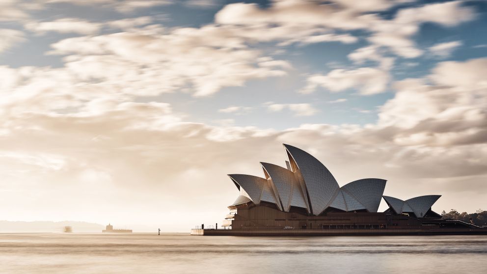 Morning sun rising over the Sydney Opera House, Sydney