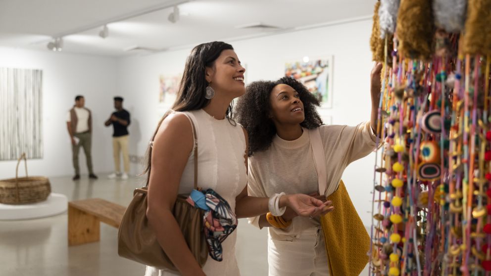 Visitors enjoying the Recent Acquisitions exhibition on at the Campbelltown Arts Centre, Campbelltown