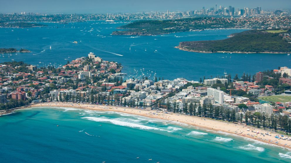 Crowds celebrating Australia Day at Manly Beach